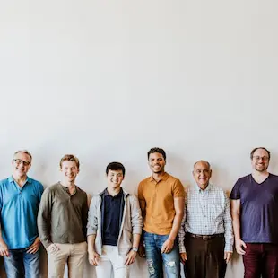 diverse men standing in a line| Becoming Well Institute